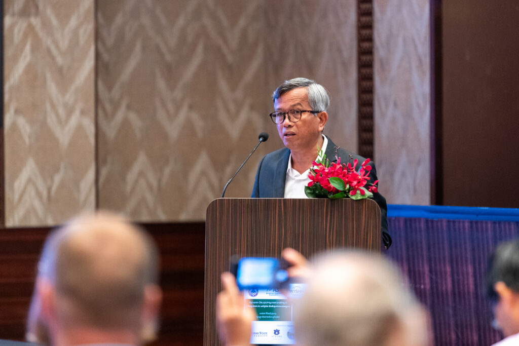 Sambath Sak speaking at the Cambodian Livestock Raiser Association's annual conference.