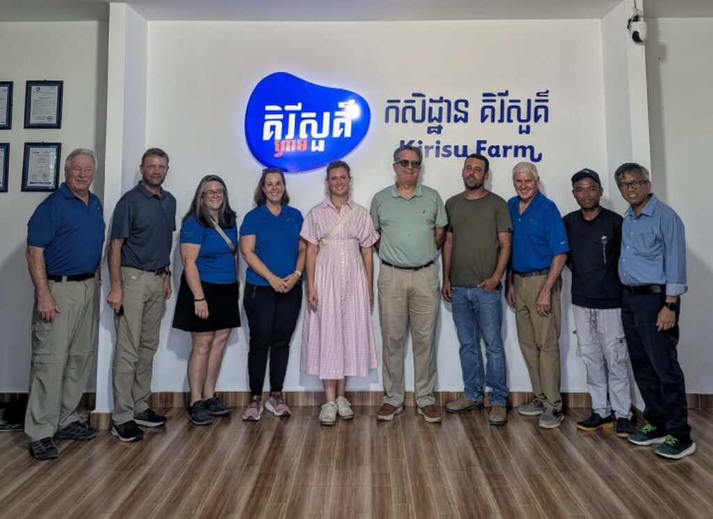 Group of people pose for a photo.