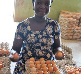 Stan Eggs 2 Musa Farm - Woman holding eggs